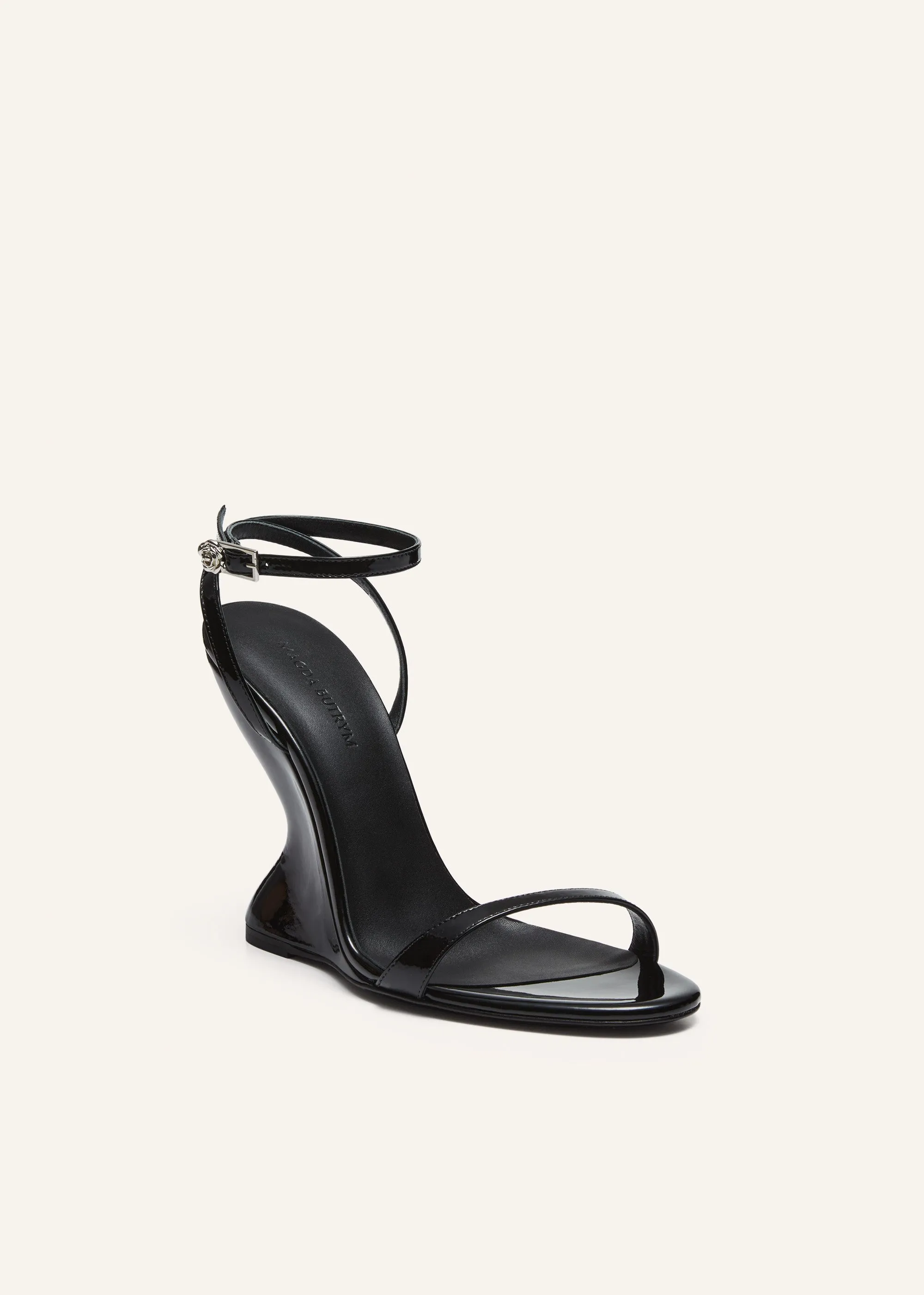 Inverted wedge strappy sandals in black patent leather